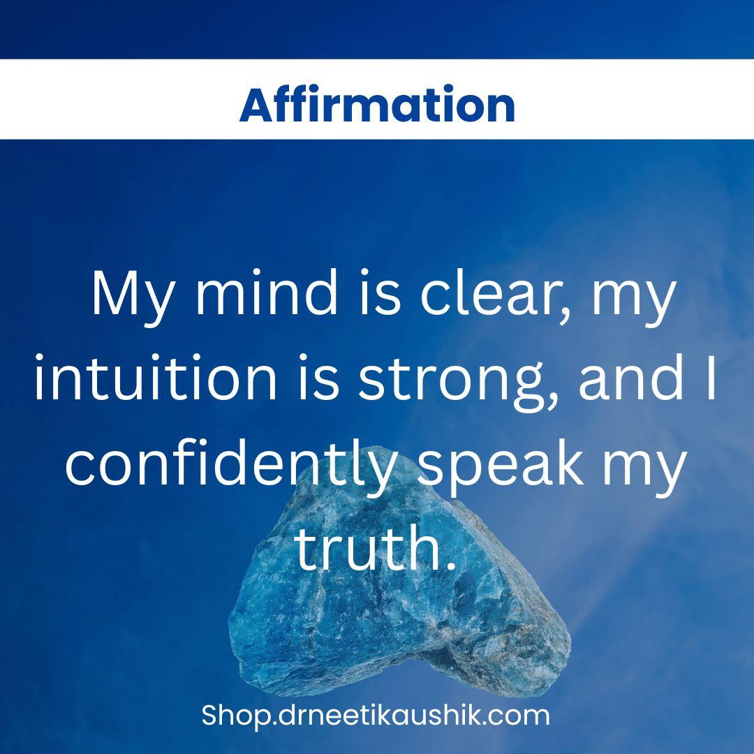 Blue crystal with affirmation text on a blue background