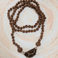 Triveni Shakti Rudraksha Mala – Gyaan, Dhan & Divya Kripa (1 Mukhi, 5 Mukhi & 7 Mukhi Rudraksha)