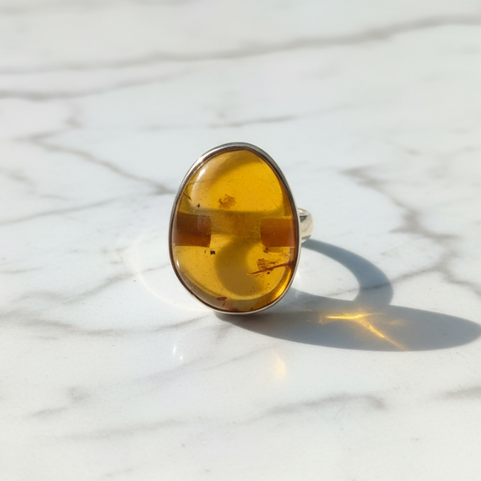 Amber ring for healing, warmth, and positive energy