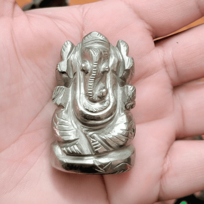 Silver Ganesh in pyrite gemstone for wealth attraction"