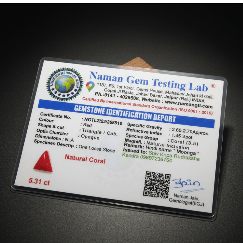 Naman Gem Testing Lab gemstone identification report on a dark background