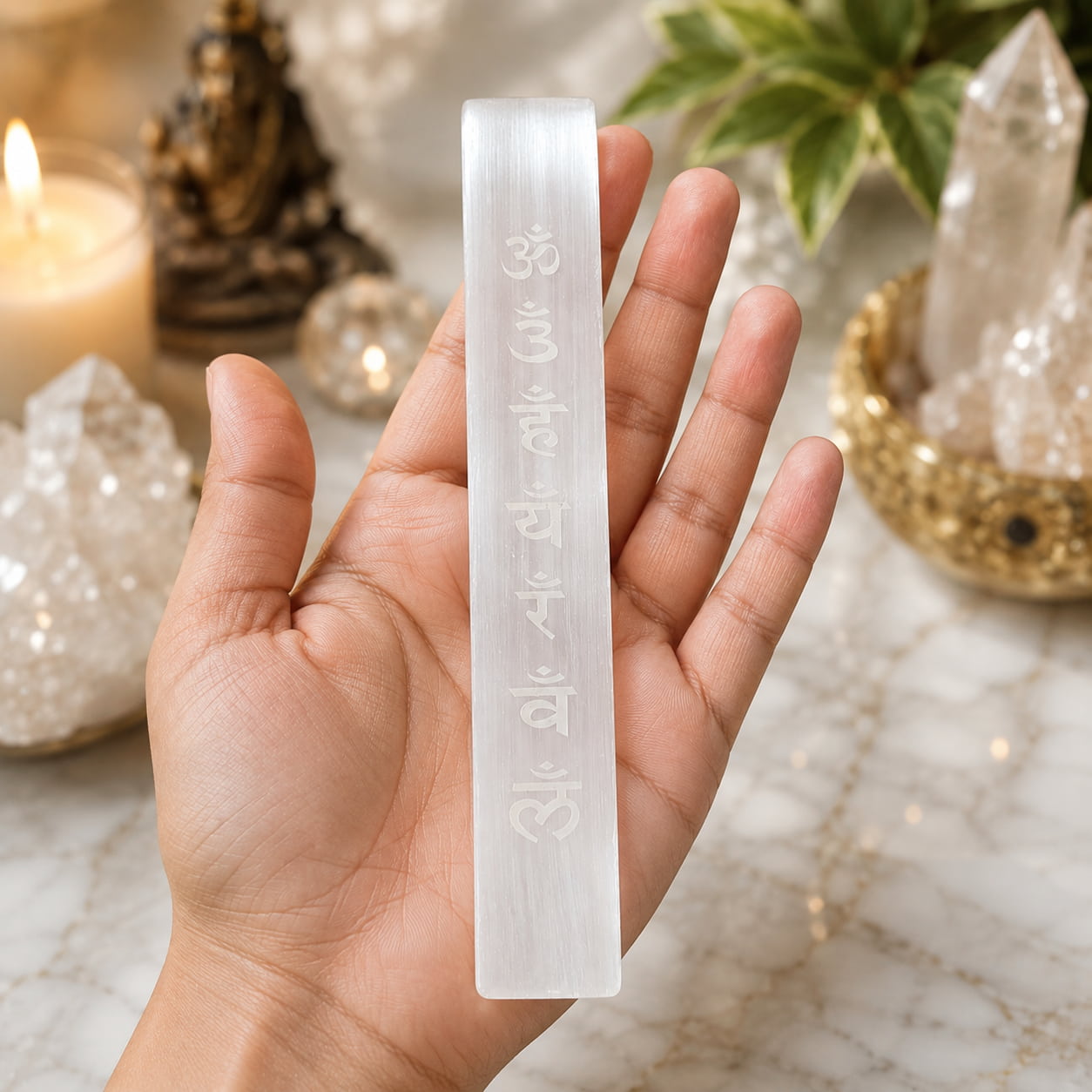 selenite stick with 7 chakra symbol for energy cleansing and chakra balancing