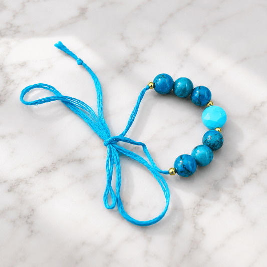 Natural Turquoise Crystal Rakhi for Name, Fame & Fearless Success
